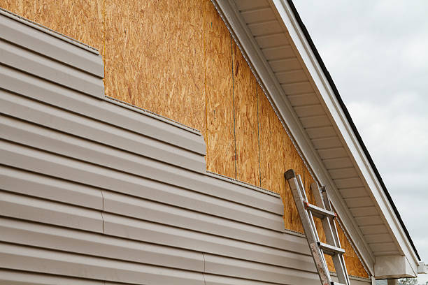 Professional Siding Replacement technician working in Hurst, TX